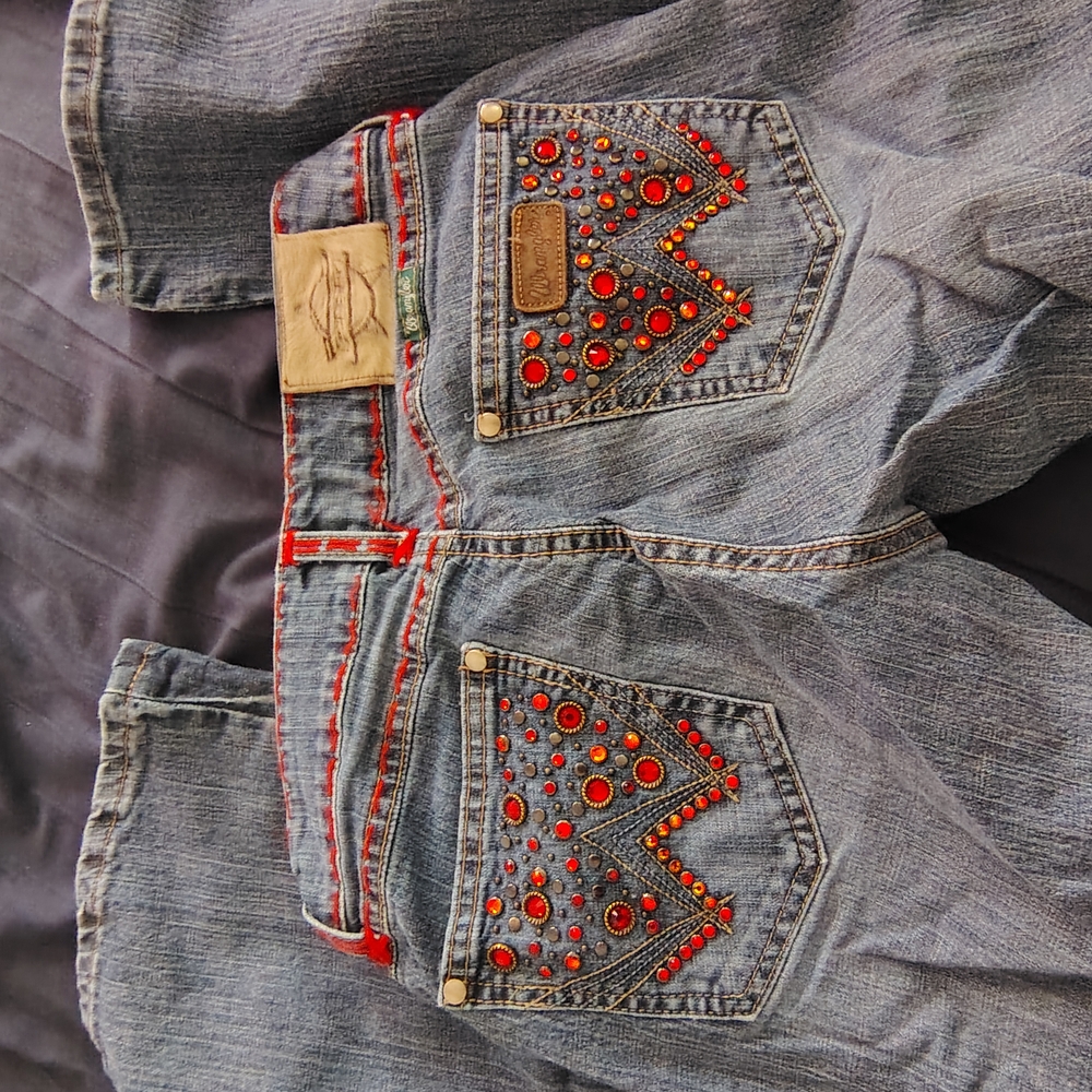 Embellished Denim Jeans with Red Accents